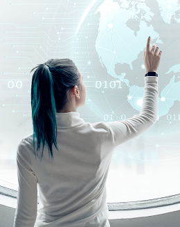 Researcher working with a spinning globe on screen