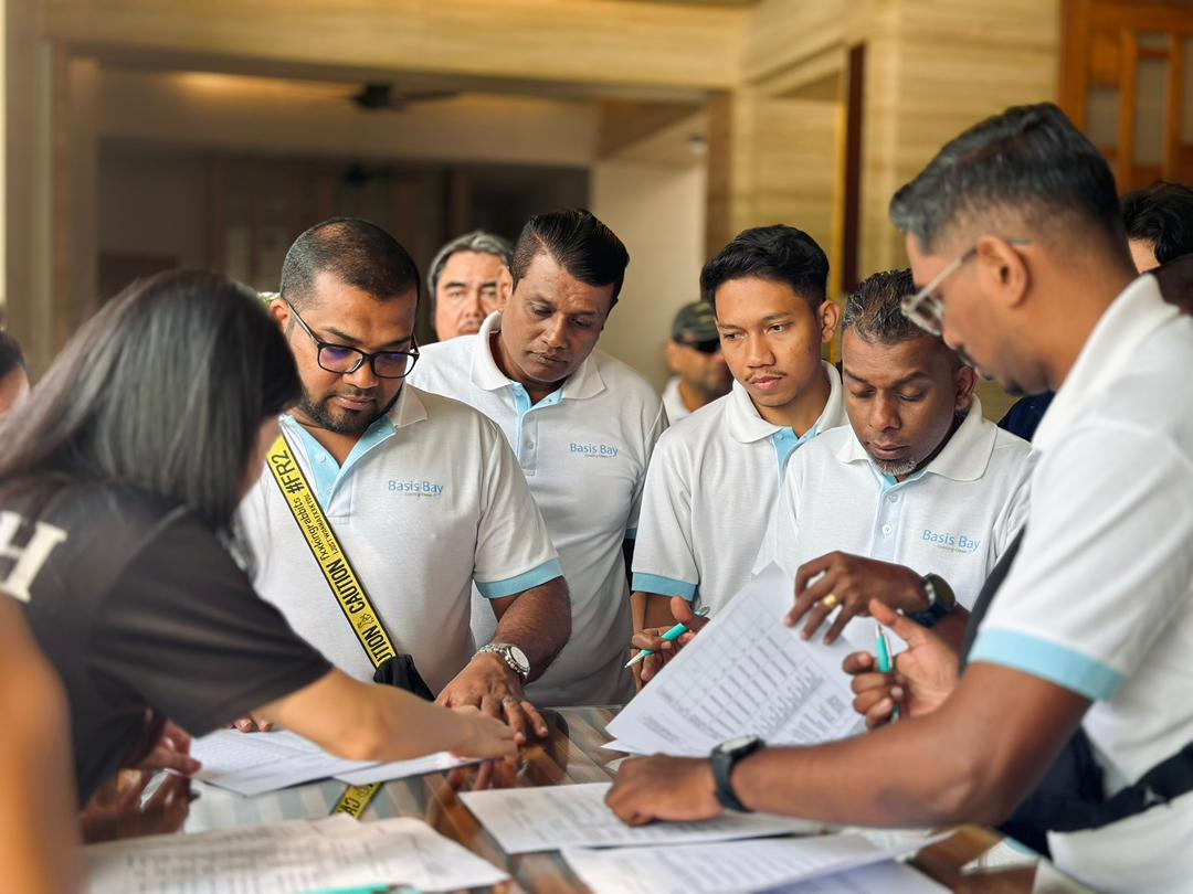 Team members reviewing activity briefs during a company day out