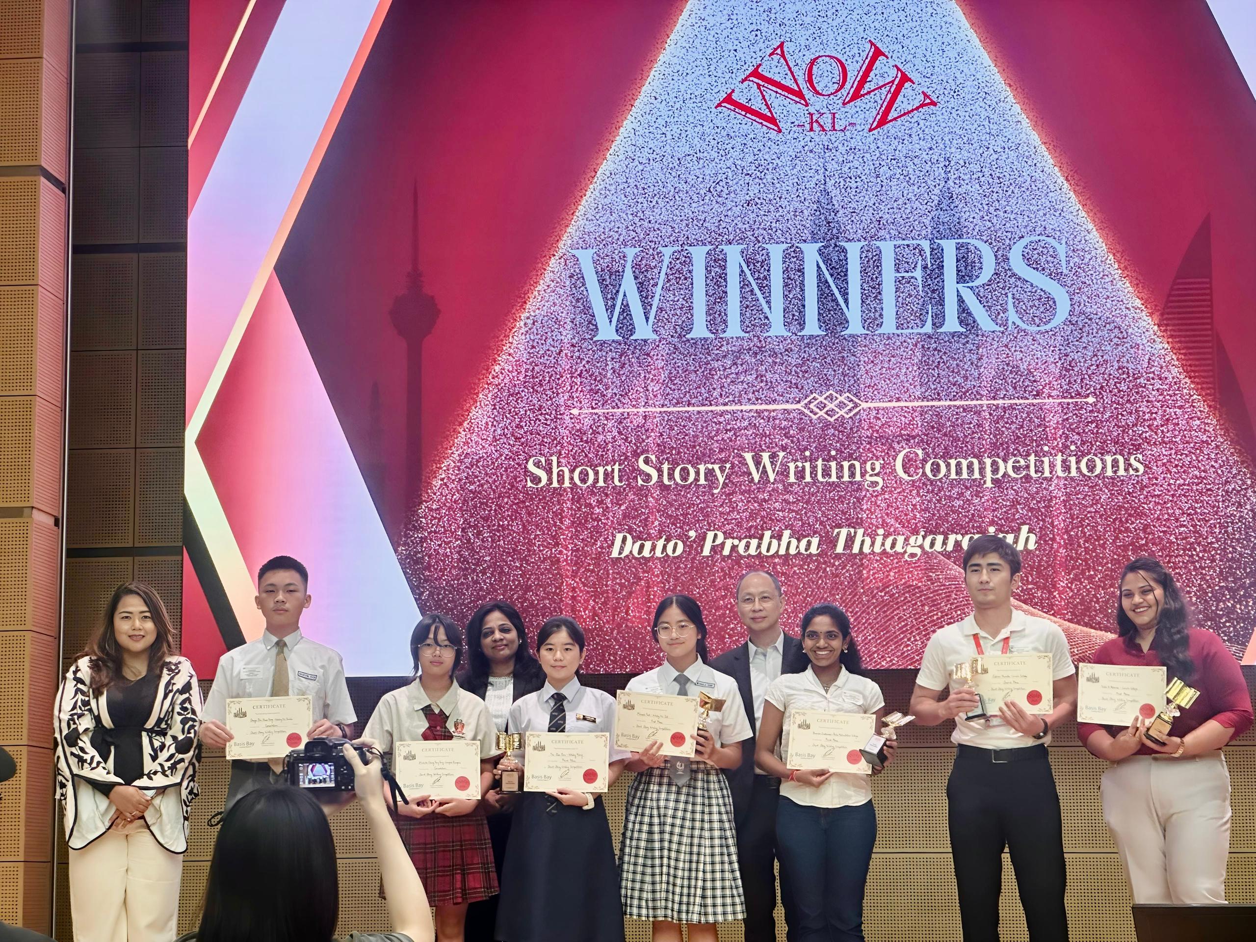 Winners of the World of Words KL short story writing competition with their certificates